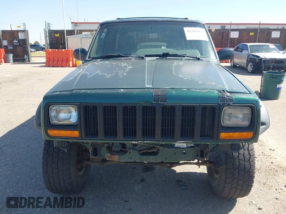 2001 Jeep Cherokee Sport z VIN 1J4FF48S81L513478, wystawiony jako IAAI lot #42245905 z przebiegiem 162 219 mil mil oraz . Historia ofert i sprzedaży dostępna na DreamBid. Obrazek 6.