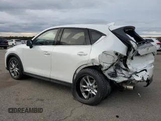 2021 Mazda CX-5 Signature with VIN JM3KFBEY5M0421694, listed as a Copart auction lot 85709714 with 28,126 mi miles and Salvage Title. Bid and sale history available at carsss.com. Image 2.