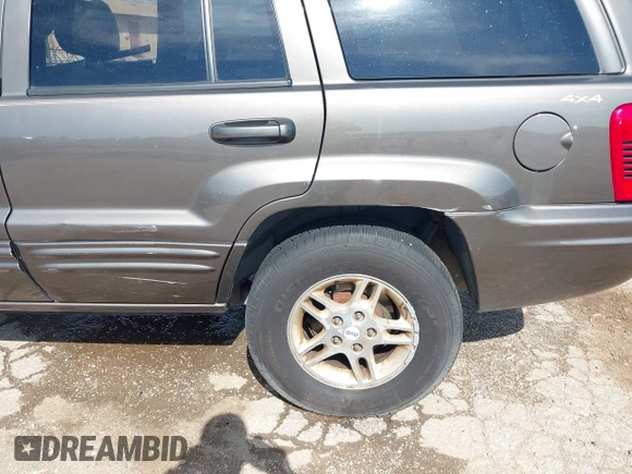 1999 Jeep Grand Cherokee Limited with VIN 1J4GW68N5XC773100, listed as a IAAI auction lot 41998432 with Not provided miles and . Bid and sale history available at DreamBid. Image 16.
