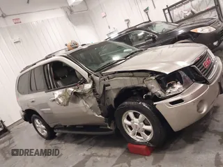 2003 GMC Envoy SLT with VIN 1GKDT13S932395367, listed as a IAAI auction lot 41544810 with 142,012 mi miles. Bid and sale history available at carsss.com. Image 12.