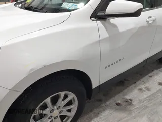 2020 Chevrolet Equinox LT with VIN 2GNAXUEV0L6128219, listed as a IAAI auction lot 41205372 with 106,611 mi miles. Bid and sale history available at carsss.com. Image 18.