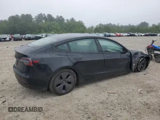 2023 Tesla Model 3 с VIN 5YJ3E1EA9PF688503, выставлен на аукционе Copart как лот 59783765 с пробегом 21 872 миль миль и Списание • Salvage title. История ставок и продаж доступна на DreamBid. Изображение 3.