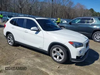 2015 BMW X1 sDrive28i with VIN WBAVM1C53FV317173, listed as a IAAI auction lot 41586385 with 146,068 mi miles. Bid and sale history available at carsss.com. Image 1.