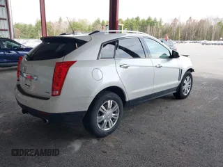 2015 Cadillac SRX Luxury Collection with VIN 3GYFNEE30FS567431, listed as a IAAI auction lot 42118084 with 140,778 mi miles. Bid and sale history available at carsss.com. Image 4.
