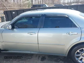 2006 Chrysler 300 C with VIN 2C3LA63H06H105774, listed as a IAAI auction lot 41918634 with 319,232 mi miles. Bid and sale history available at carsss.com. Image 14.