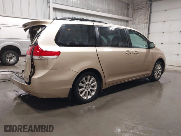 2014 Toyota Sienna Ltd with VIN 5TDDK3DCXES074614, listed as a IAAI auction lot 41691123 with 117,571 mi miles. Bid and sale history available at carsss.com. Image 4.
