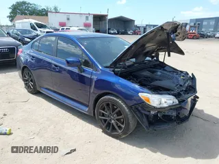 2021 Subaru WRX Premium z VIN JF1VA1C66M9823354, wystawiony jako IAAI lot #41947618 z przebiegiem 67 019 mil mil oraz . Historia ofert i sprzedaży dostępna na DreamBid. Obrazek 1.