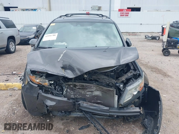 2015 Honda Odyssey Touring Elite with VIN 5FNRL5H99FB089642, listed as a IAAI auction lot 42591786 with 100,755 mi miles and . Bid and sale history available at DreamBid. Image 13.