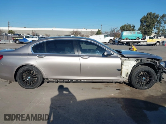 2015 BMW 7 Series 750Li with VIN WBAYE8C55FD782384, listed as a IAAI auction lot 41319363 with 75,784 mi miles. Bid and sale history available at carsss.com. Image 14.