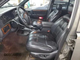 1996 Jeep Grand Cherokee Limited with VIN 1J4GZ78S5TC210710, listed as a Copart auction lot 81307904 with 285,169 mi miles and Salvage Title. Bid and sale history available at carsss.com. Image 7.