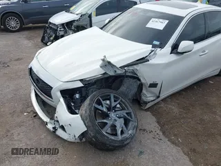 2015 Infiniti Q50 Premium z VIN JN1BV7APXFM352327, wystawiony jako IAAI lot #42367983 z przebiegiem 110 636 mil mil oraz . Historia ofert i sprzedaży dostępna na DreamBid. Obrazek 6.
