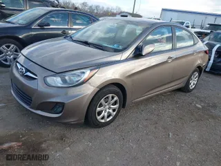 2013 Hyundai Accent GLS with VIN KMHCT4AEXDU464526, listed as a IAAI auction lot 41904354 with 157,368 mi miles. Bid and sale history available at carsss.com. Image 2.
