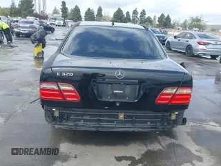 2000 Mercedes-Benz E-Class with VIN WDBJF65JXYA997410, listed as a IAAI auction lot 41939485 with 158,559 mi miles. Bid and sale history available at carsss.com. Image 6.
