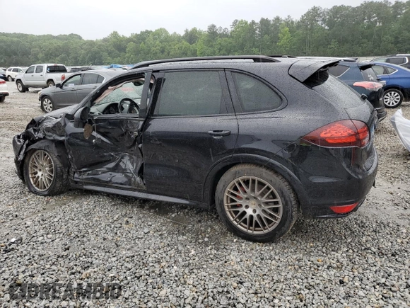 2013 Porsche Cayenne GTS с VIN WP1AD2A23DLA75220, выставлен на аукционе Copart как лот 55745765 с пробегом Не указан миль и Списание • Salvage title. История ставок и продаж доступна на DreamBid. Изображение 2.