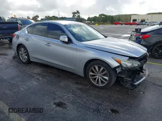 2015 Infiniti Q50 Premium with VIN JN1BV7AP9FM358782, listed as a IAAI auction lot 41103963 with 96,853 mi miles. Bid and sale history available at carsss.com. Image 1.