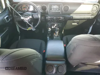 2022 Jeep Wrangler Unlimited Sport S with VIN 1C4HJXDNXNW256780, listed as a Copart auction lot 76101474 with 56,954 mi miles and Salvage Title. Bid and sale history available at carsss.com. Image 8.