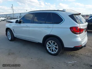 2016 BMW X5 xDrive35i with VIN 5UXKR0C54G0P27141, listed as a IAAI auction lot 41553602 with 61,947 mi miles. Bid and sale history available at carsss.com. Image 3.