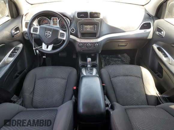 2017 Dodge Journey SXT z VIN 3C4PDCBG7HT547666, wystawiony jako Copart lot #57987875 z przebiegiem 124 484 mil mil oraz Szkoda całkowita • Salvage title. Historia ofert i sprzedaży dostępna na DreamBid. Obrazek 8.