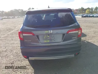 2020 Honda Pilot EX-L z VIN 5FNYF6H53LB069677, wystawiony jako IAAI lot #40581586 z przebiegiem 21 717 mil mil oraz . Historia ofert i sprzedaży dostępna na DreamBid. Obrazek 17.