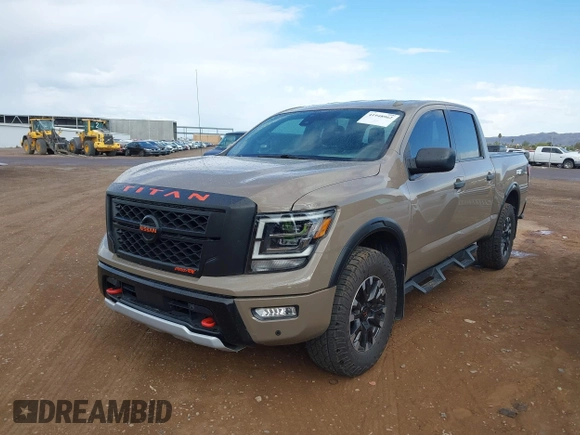 2021 Nissan Titan Pro-4X with VIN 1N6AA1ED9MN519749, listed as a IAAI auction lot 41948962 with 65,807 mi miles and . Bid and sale history available at DreamBid. Image 6.