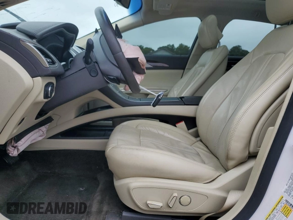 2015 Lincoln MKZ with VIN 3LN6L2G98FR623999, listed as a Copart auction lot 58629455 with 74,802 mi miles and Salvage title. Bid and sale history available at DreamBid. Image 7.