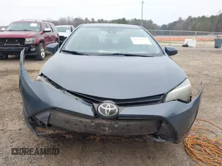 2019 Toyota Corolla L z VIN 2T1BURHE3KC191830, wystawiony jako IAAI lot #41798764 z przebiegiem 169 558 mil mil oraz . Historia ofert i sprzedaży dostępna na DreamBid. Obrazek 13.