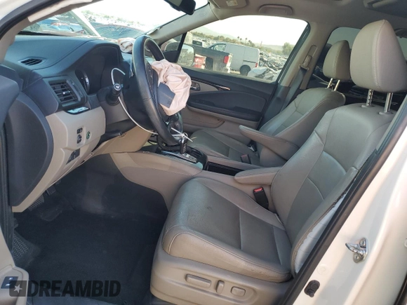 2017 Honda Pilot Touring with VIN 5FNYF6H92HB092491, listed as a Copart auction lot 76141434 with 56,002 mi miles and Salvage Title. Bid and sale history available at carsss.com. Image 7.