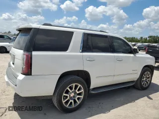 2015 GMC Yukon Denali with VIN 1GKS1CKJ3FR579085, listed as a Copart auction lot 67657084 with 98,456 mi miles and Salvage Title. Bid and sale history available at carsss.com. Image 3.