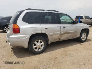2004 GMC Envoy SLT with VIN 1GKDT13S842439635, listed as a Copart auction lot 63317194 with 201,672 mi miles and Salvage Title. Bid and sale history available at carsss.com. Image 3.