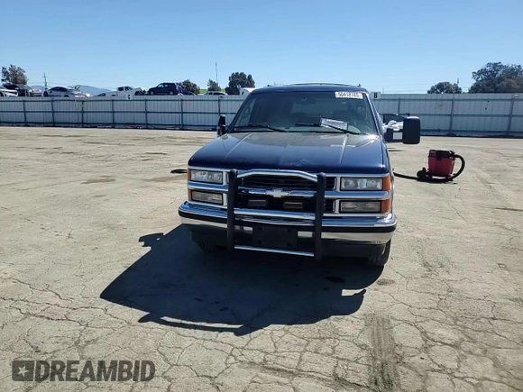 1999 Chevrolet Suburban with VIN 1GNEC16R1XJ394144, listed as a Copart auction lot 50418185 with 173,037 mi miles and Salvage title. Bid and sale history available at DreamBid. Image 10.