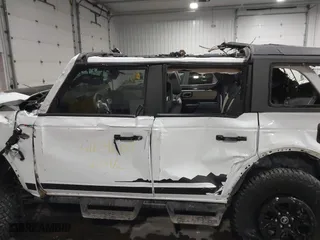 2024 Ford Bronco Wildtrak with VIN 1FMEE2BP9RLA70391, listed as a IAAI auction lot 41639603 with 11,086 mi miles. Bid and sale history available at carsss.com. Image 14.