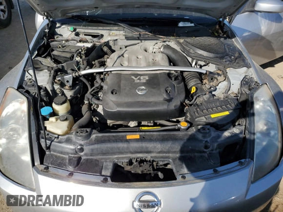 2003 Nissan 350Z Touring z VIN JN1AZ34E73T016672, wystawiony jako Copart lot #52968375 z przebiegiem 125 844 mil mil oraz Szkoda całkowita • Salvage title. Historia ofert i sprzedaży dostępna na DreamBid. Obrazek 11.