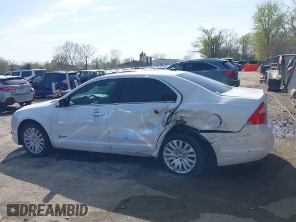 2012 Ford Fusion Hybrid с VIN 3FADP0L31CR325835, выставлен на аукционе IAAI как лот 41982489 с пробегом 124 266 миль миль и . История ставок и продаж доступна на DreamBid. Изображение 14.