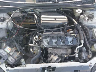 2004 Honda Civic EX with VIN 1HGEM21964L044478, listed as a IAAI auction lot 42153605 with 268,851 mi miles and . Bid and sale history available at DreamBid. Image 10.