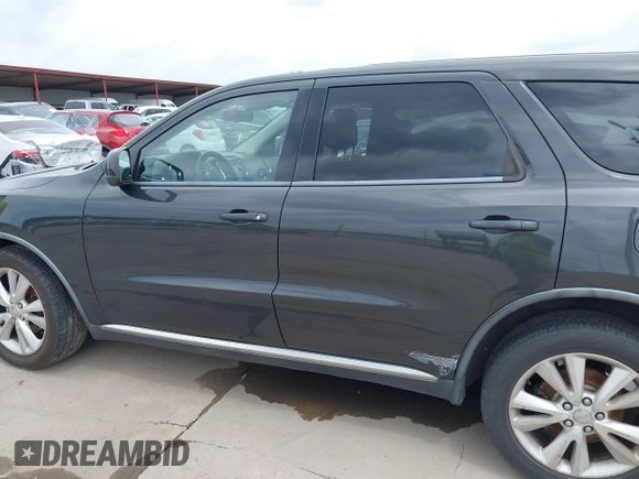 2011 Dodge Durango Express z VIN 1D4RE2GG9BC707433, wystawiony jako IAAI lot #42661703 z przebiegiem 172 128 mil mil oraz . Historia ofert i sprzedaży dostępna na DreamBid. Obrazek 14.