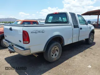2002 Ford F-150 XL with VIN 2FTRX18W02CA22920, listed as a IAAI auction lot 42426790 with 153,433 mi miles and . Bid and sale history available at DreamBid. Image 4.