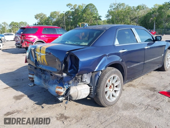2005 Chrysler 300 300C AWD z VIN 2C3AK63H05H672425, wystawiony jako IAAI lot #42224241 z przebiegiem 143 185 mil mil oraz . Historia ofert i sprzedaży dostępna na DreamBid. Obrazek 12.