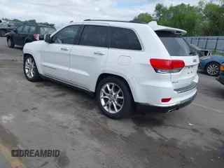 2014 Jeep Grand Cherokee Summit z VIN 1C4RJFJG2EC476114, wystawiony jako IAAI lot #42249108 z przebiegiem 97 569 mil mil oraz . Historia ofert i sprzedaży dostępna na DreamBid. Obrazek 3.