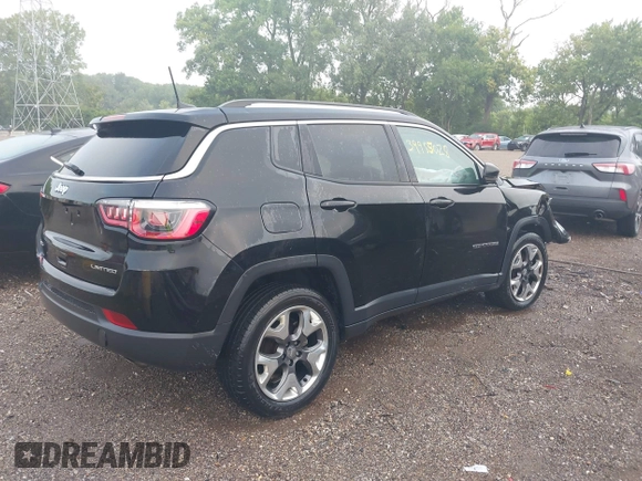 2018 Jeep Compass Limited with VIN 3C4NJDCB1JT354234, listed as a IAAI auction lot 39985028 with 76,293 mi miles. Bid and sale history available at carsss.com. Image 4.