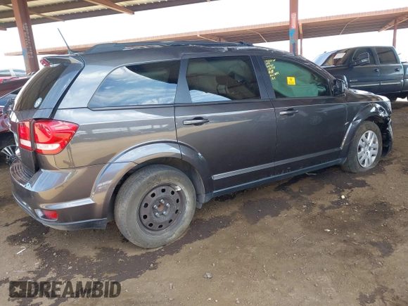 2019 Dodge Journey SE z VIN 3C4PDCBG9KT798938, wystawiony jako IAAI lot #42174970 z przebiegiem Nie podano mil oraz . Historia ofert i sprzedaży dostępna na DreamBid. Obrazek 4.