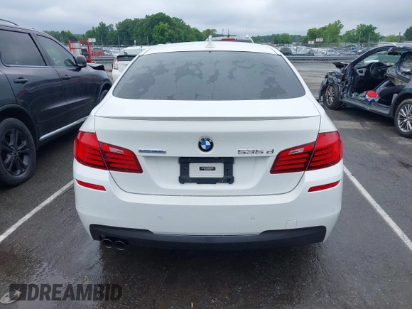 2014 BMW 5 Series 535d z VIN WBAXA5C53ED690727, wystawiony jako IAAI lot #42344800 z przebiegiem 128 153 mil mil oraz . Historia ofert i sprzedaży dostępna na DreamBid. Obrazek 16.