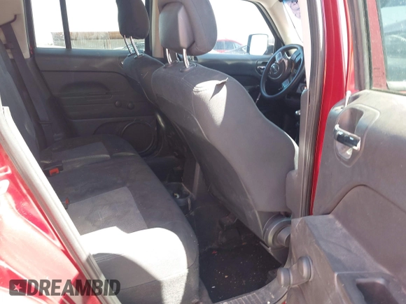 2014 Jeep Patriot Sport with VIN 1C4NJPBA6ED547680, listed as a IAAI auction lot 42140782 with 119,927 mi miles and . Bid and sale history available at DreamBid. Image 8.