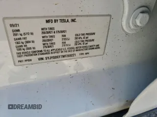 2021 Tesla Model Y Performance with VIN 5YJYGDEF7MF269221, listed as a Copart auction lot 52109785 with 61,619 mi miles and Salvage Title. Bid and sale history available at DreamBid. Image 13.