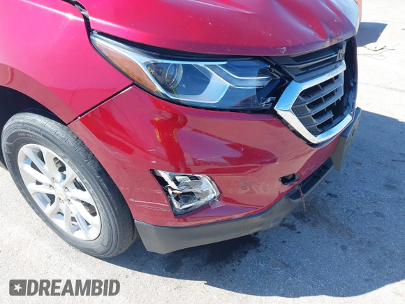 2021 Chevrolet Equinox LT z VIN 2GNAXUEV2M6108703, wystawiony jako IAAI lot #41965639 z przebiegiem 122 160 mil mil oraz . Historia ofert i sprzedaży dostępna na DreamBid. Obrazek 18.