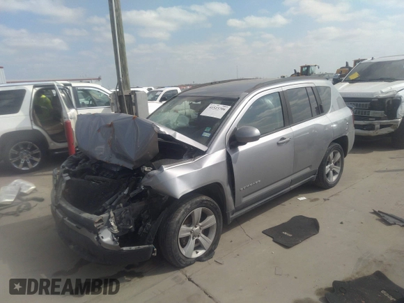 2016 Jeep Compass Latitude with VIN 1C4NJDEBXGD594149, listed as a IAAI auction lot 41523706 with 113,200 mi miles. Bid and sale history available at carsss.com. Image 2.