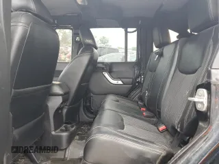 2015 Jeep Wrangler Unlimited Freedom with VIN 1C4BJWDG6FL568583, listed as a Copart auction lot 54266315 with Not provided miles and Salvage title. Bid and sale history available at DreamBid. Image 11.