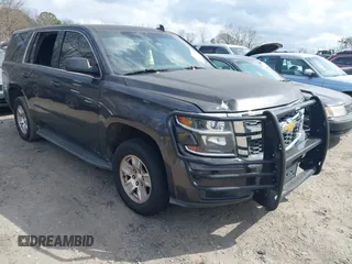 2017 Chevrolet Tahoe Commercial with VIN 1GNLCDEC2HR256539, listed as a IAAI auction lot 41718466 with 202,134 mi miles and . Bid and sale history available at DreamBid. Image 1.
