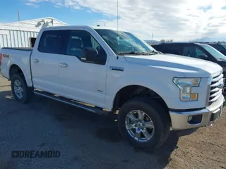 2015 Ford F-150 XLT with VIN 1FTEW1EG9FKD92005, listed as a IAAI auction lot 41706605 with 205,890 mi miles. Bid and sale history available at carsss.com. Image 1.