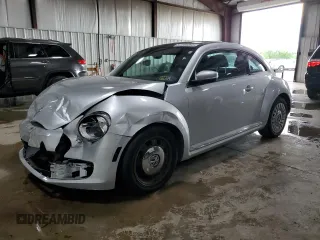2013 Volkswagen Beetle 2.5L w/Sun with VIN 3VWJP7AT5DM689423, listed as a Copart auction lot 57631435 with 12,306 mi miles and Salvage title. Bid and sale history available at DreamBid. Image 1.