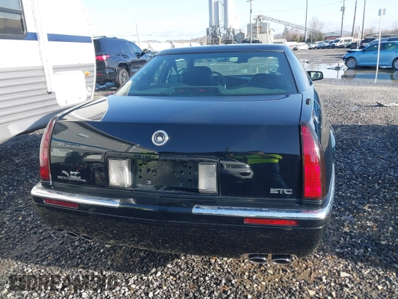 1999 Cadillac Eldorado Touring z VIN 1G6ET129XXU603042, wystawiony jako IAAI lot #41699955 z przebiegiem 81 704 mil mil oraz . Historia ofert i sprzedaży dostępna na DreamBid. Obrazek 17.